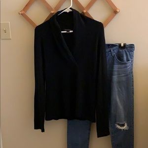 Shawl neck black sweater.